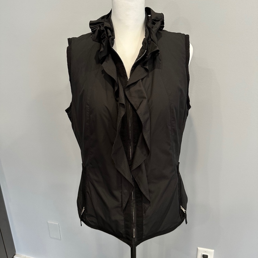 Elie Tahari Black “puffy” vest. Zip off hood. Ladies L; like new! Never worn!